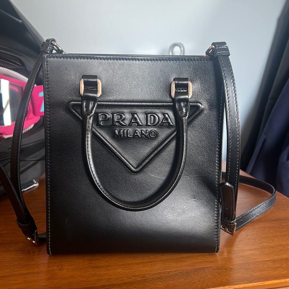 Black Prada top handle small purse.